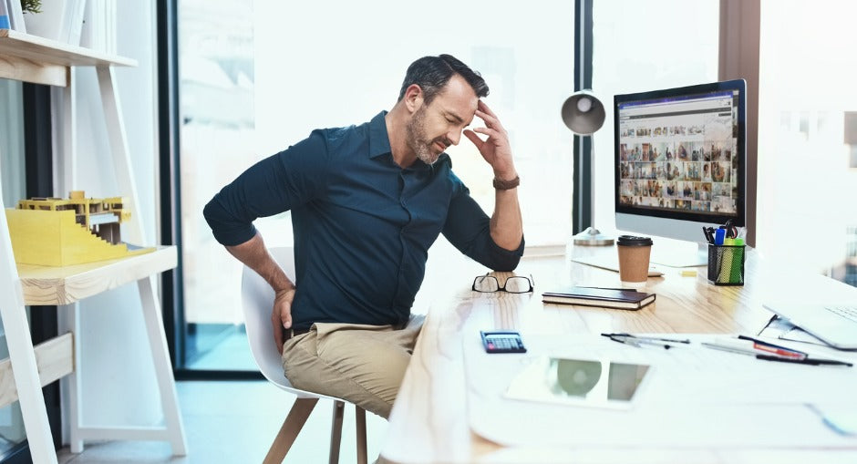 office person suffering from hip pain